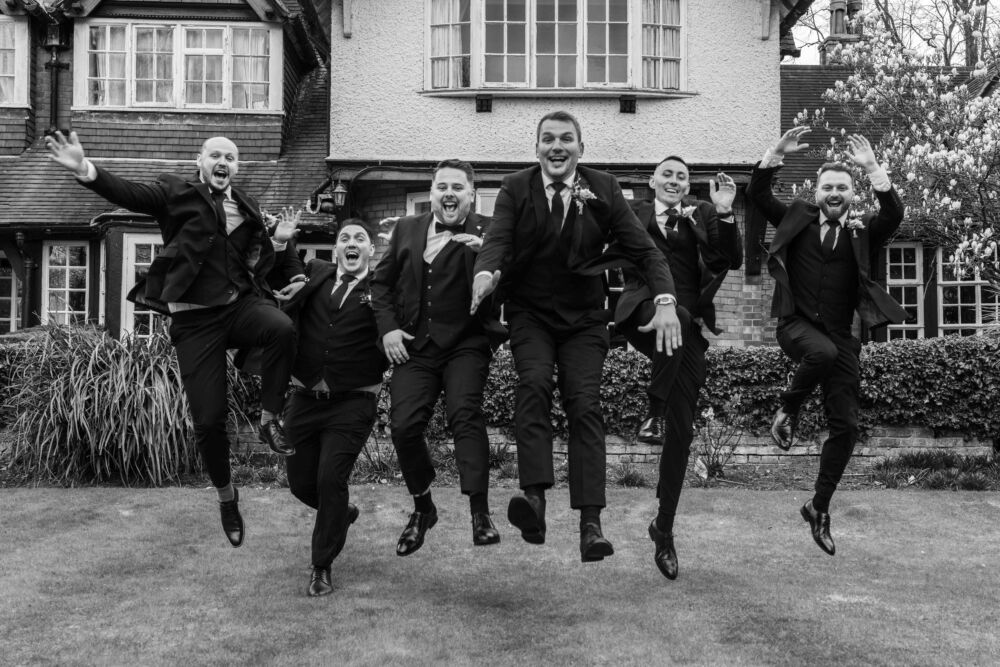 groomsmen photo, groomsmen jumping in the air, the mere court wedding